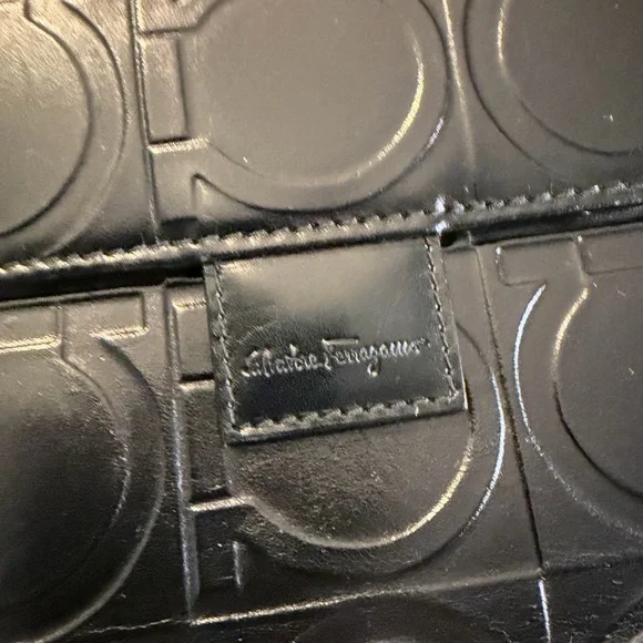 Salvatore Ferragamo Gancini Black Embossed Bifold Leather Wallet